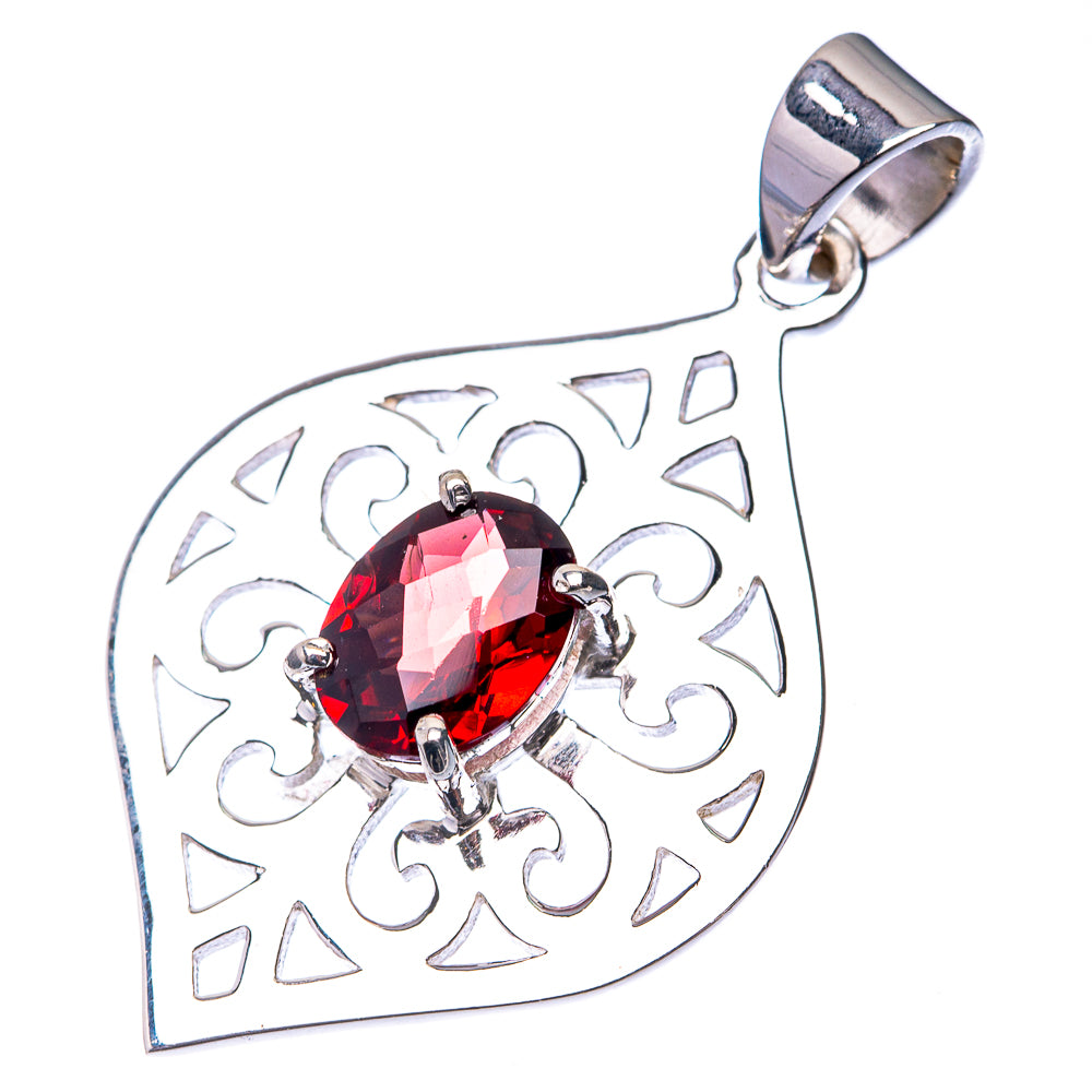 Heart garnet pendant in 925 sterling silver with raised red gemstone and decorative filigree