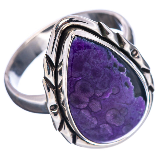 Ornate sterling silver ring featuring large purple sugilite oval bezel on band
