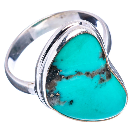 Sterling silver turquoise ring with curved band and oval bezel-set turquoise cabochon