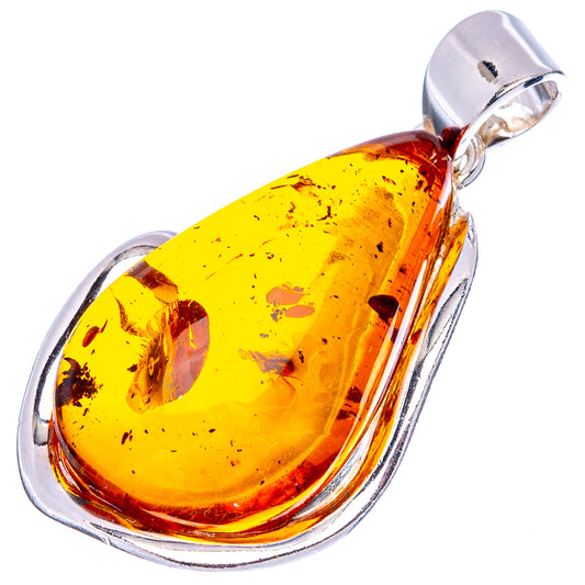 Amber teardrop pendant in .925 sterling silver with polished bail, oval setting