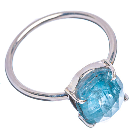 Sterling silver open-band ring with faceted oval aquamarine-blue gemstone