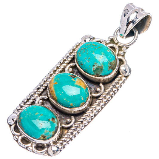 Sterling silver turquoise cabochon pendant with three oval stones in ornate frame