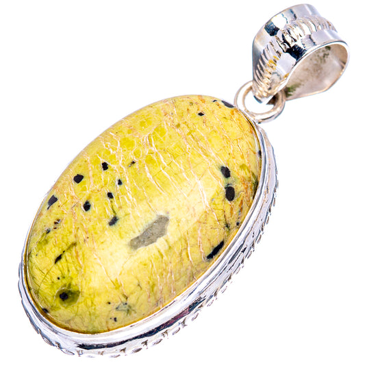 Oval yellow Atlantisite pendant in .925 sterling silver with black speckled stone and bail