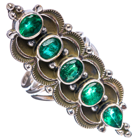 Faceted emerald cluster ring with five green oval stones and .925 sterling silver band