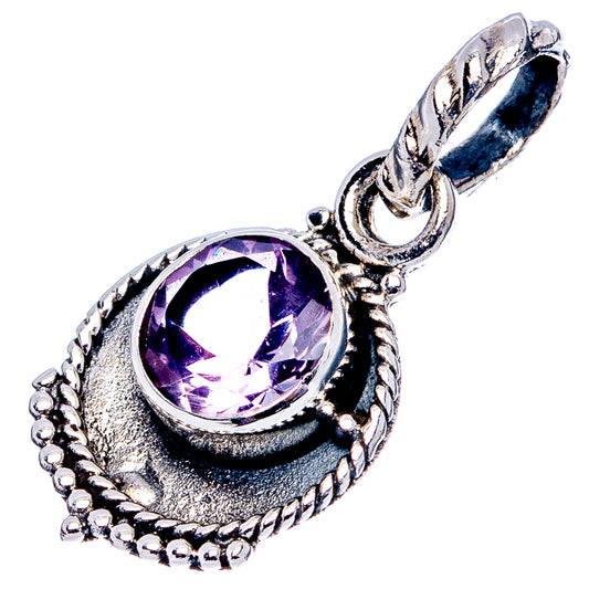 Sterling silver amethyst pendant with round purple gemstone and linked bail detail
