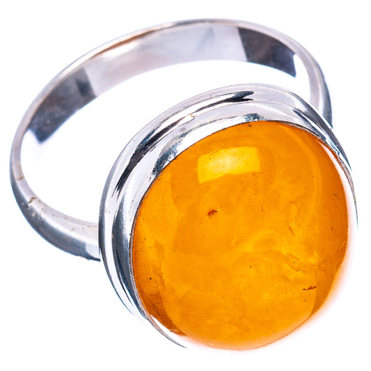 Orange amber cabochon in 925 sterling silver ring with wide polished band