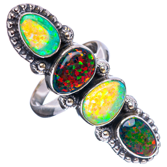 Sterling silver statement ring with four oval opal-look stones, dark and green flashes