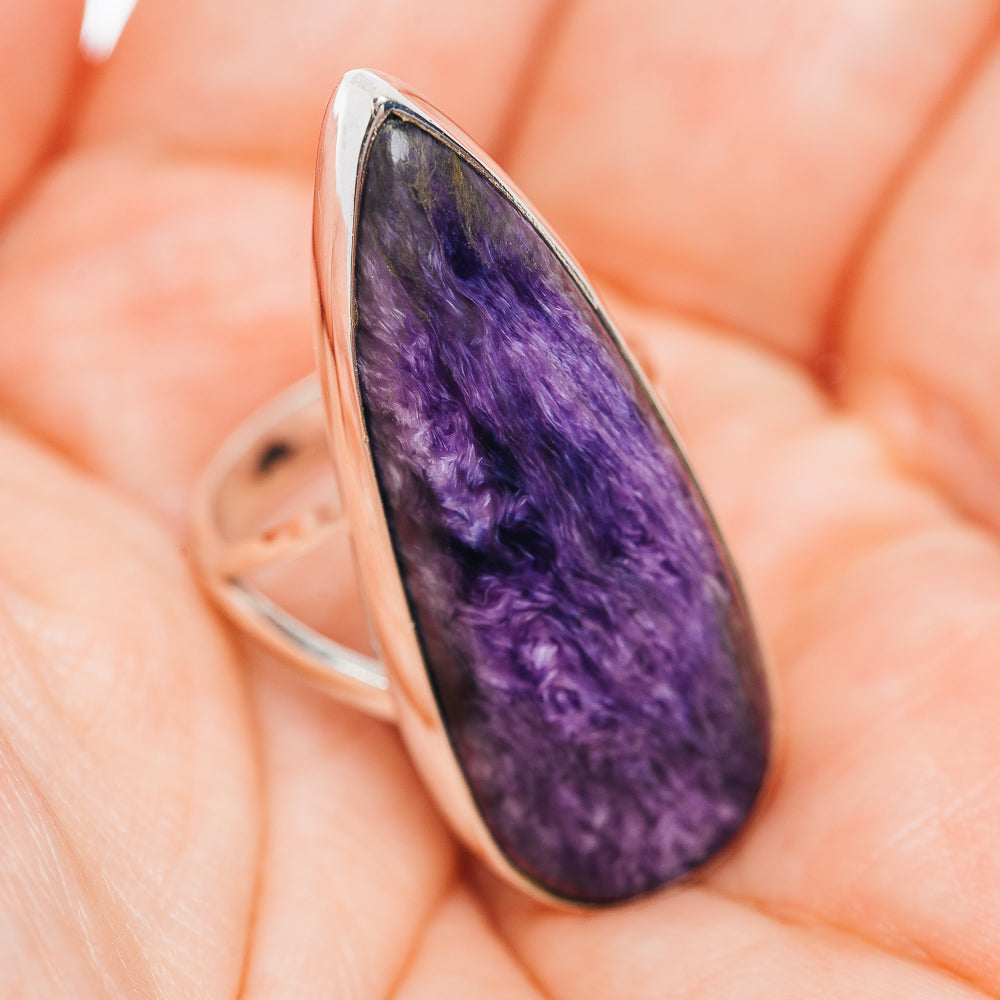 Teardrop charoite cabochon sterling silver ring, purple gemstone side view