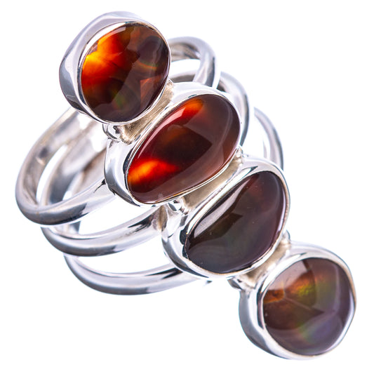 Sterling silver multi-stone ring, size 7.75, with four oval fire opal cabochons and red glow.