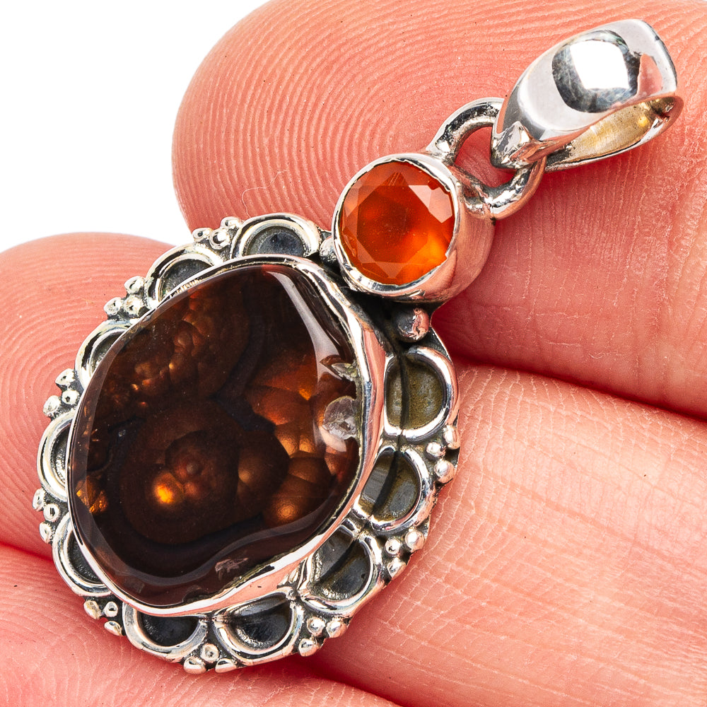 925 sterling silver oval fire agate pendant with round orange gemstone accents