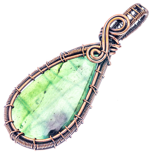 Oxidized copper wire-wrapped teardrop pendant with translucent green nephrite jade cabochon