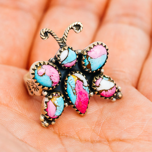 Southwestern butterfly ring with multicolor cabochon stones and blackened silver setting