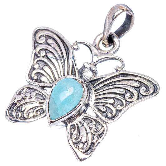 Sterling silver butterfly pendant with aquamarine-blue oval center stone and detailed wings
