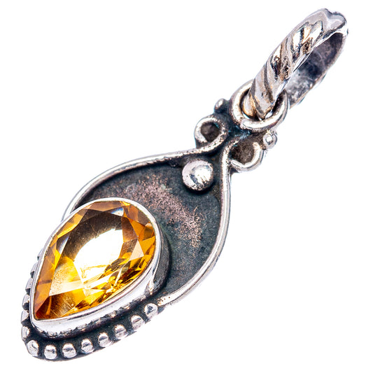Teardrop sterling silver citrine pendant with ornate halo and loop bail