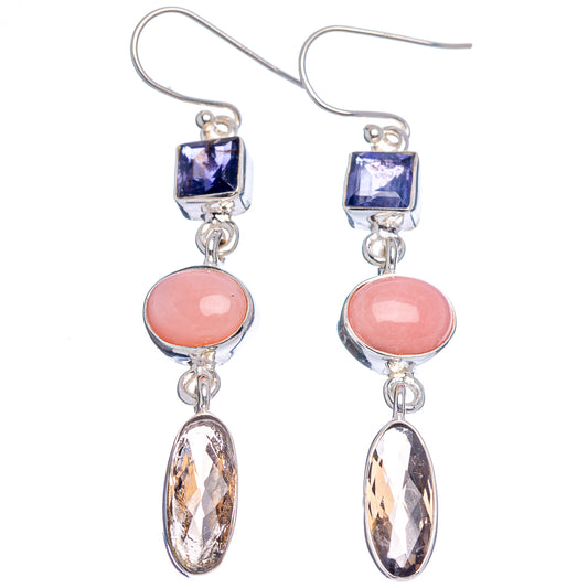 Sterling silver dangle earrings with dark blue square stones, pink cabochons, and dark drops