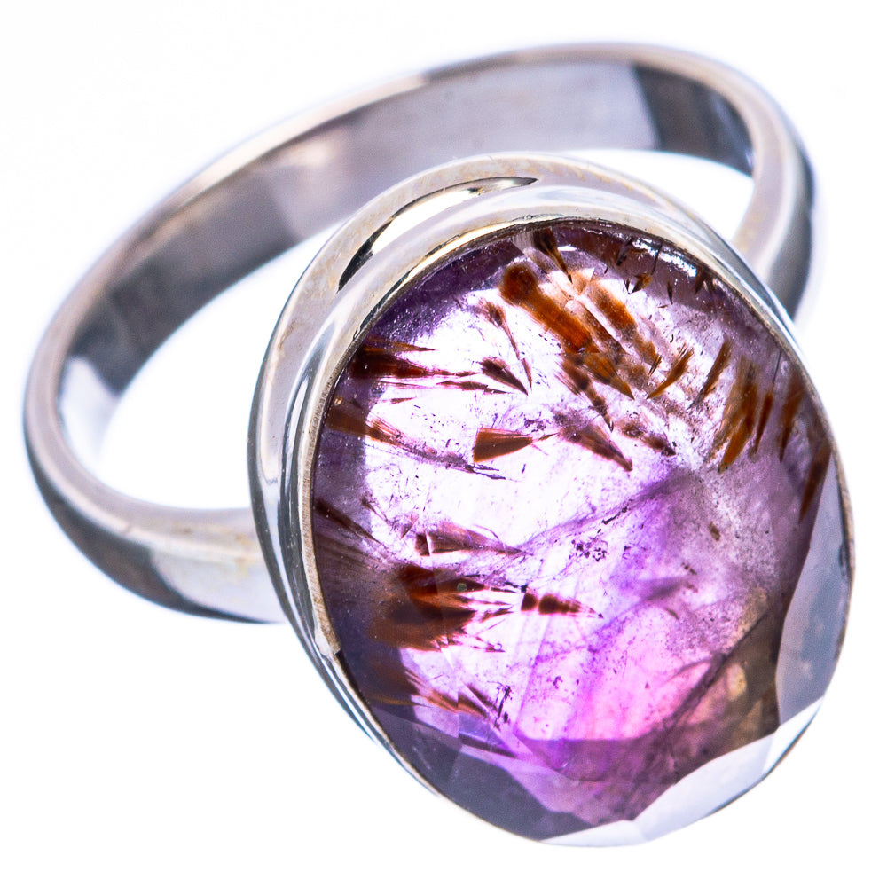 Faceted oval purple gemstone set in polished sterling-silver ring