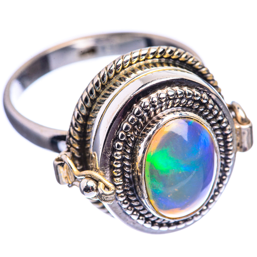 Oval opal in sterling silver ring, blue-green glow, raised rope and bead edging