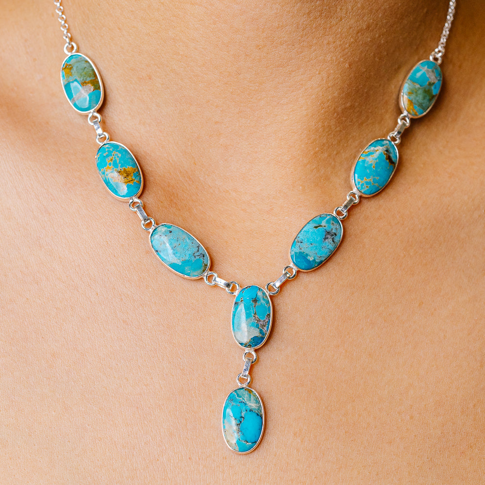 Turquoise blue oval stone necklace with sterling silver link chain and bezel settings