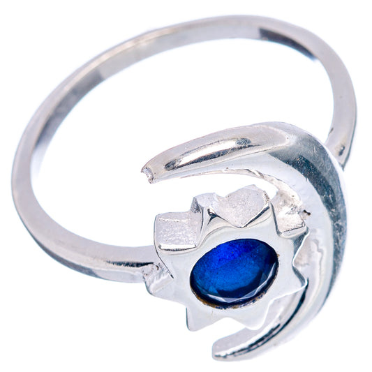 Sterling silver ring with curled moon detail and dark blue cabochon gemstone, size 8