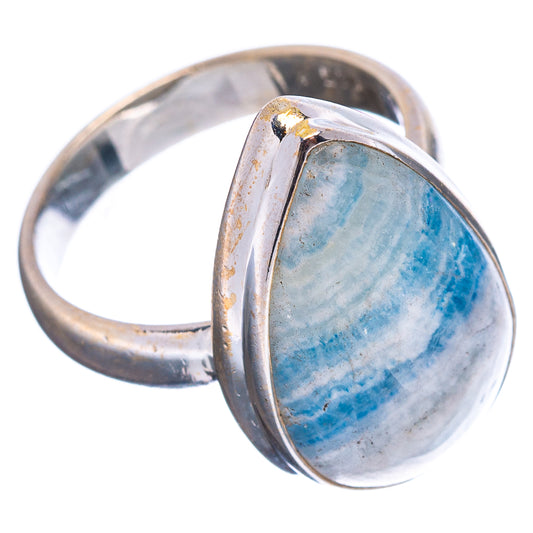 Blue oval scheelite gemstone sterling silver ring with open split shank and bezel