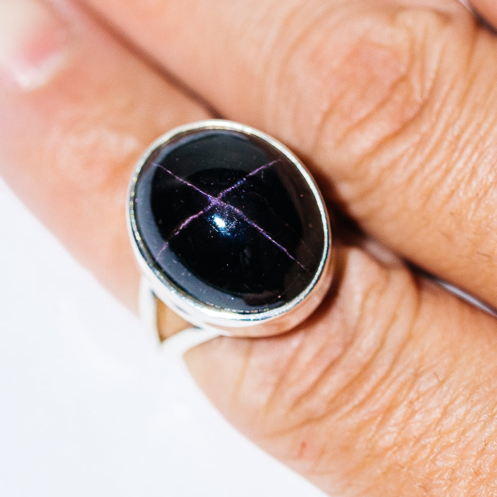 925 sterling silver ring with oval dark star garnet gemstone set in bezel