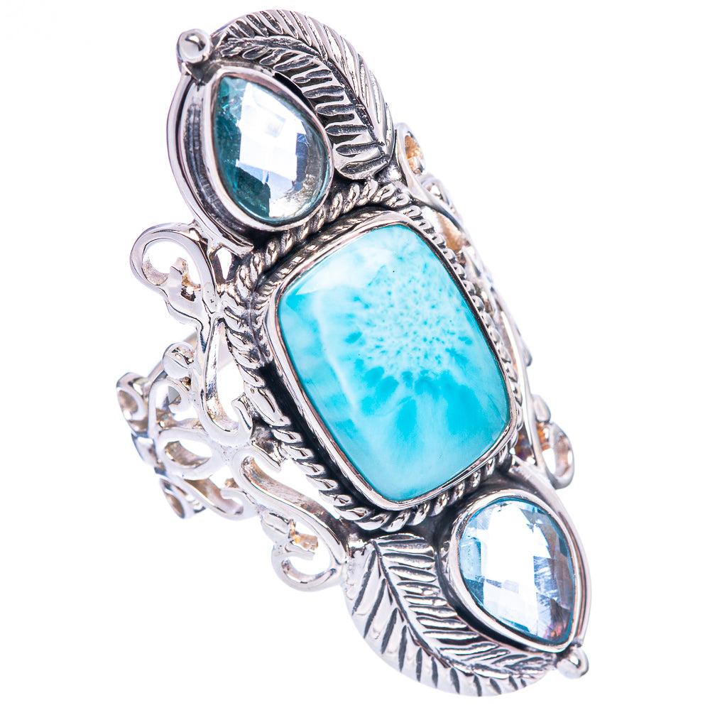 Sterling silver cuff-style ring with oval light-blue center stone and round side stones