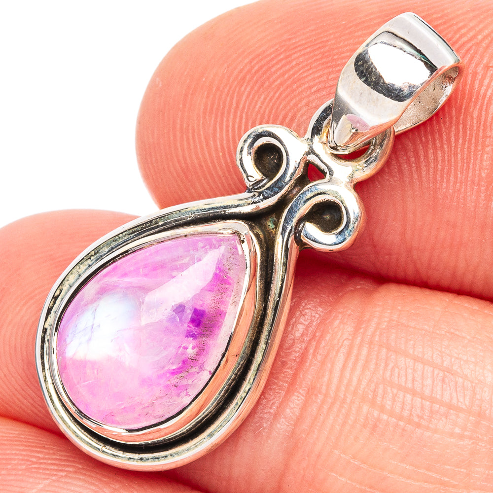 Sterling silver pendant with pink pear-shaped gemstone and polished bail