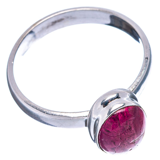 Sterling silver ring featuring oval pink tourmaline cabochon, side view