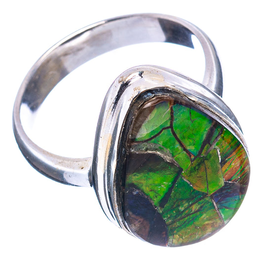 Sterling silver ammolite ring with oval green iridescent gemstone, side view.