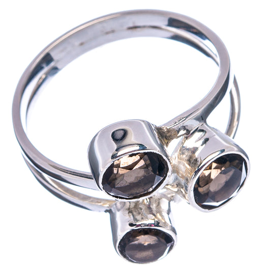 Sterling silver band ring with three round smoky quartz stones and raised bezel design