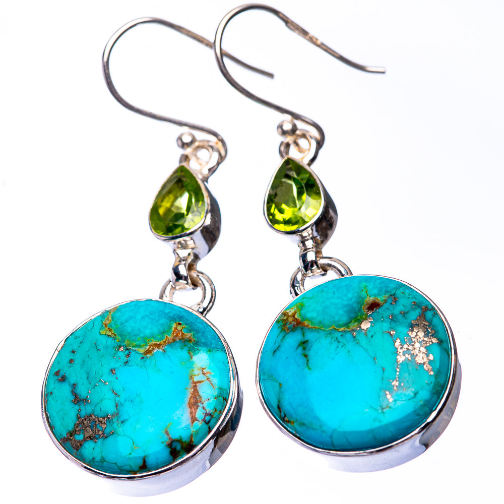 Pair of silver drop earrings with round turquoise cabochons and peridot-green teardrops