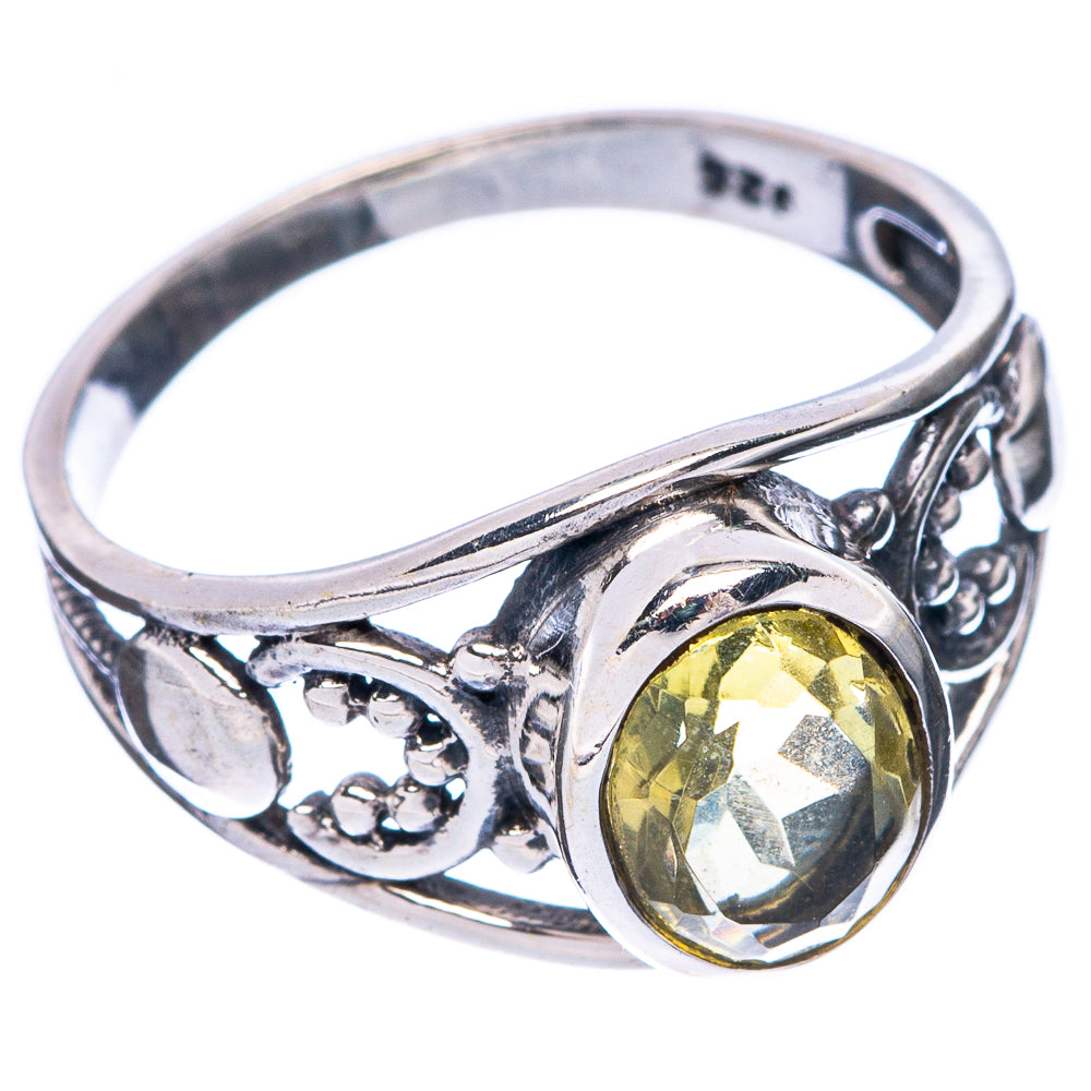 925 sterling silver ring with faceted yellow citrine, ornate band scrollwork, side view