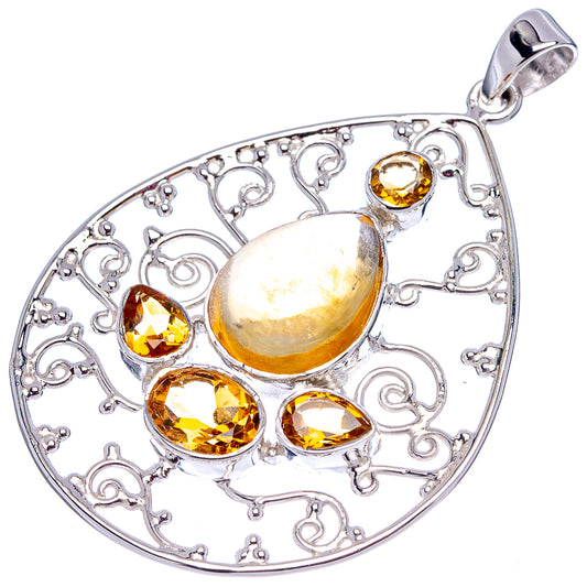Sterling silver teardrop pendant with golden citrine stones and central cabochon