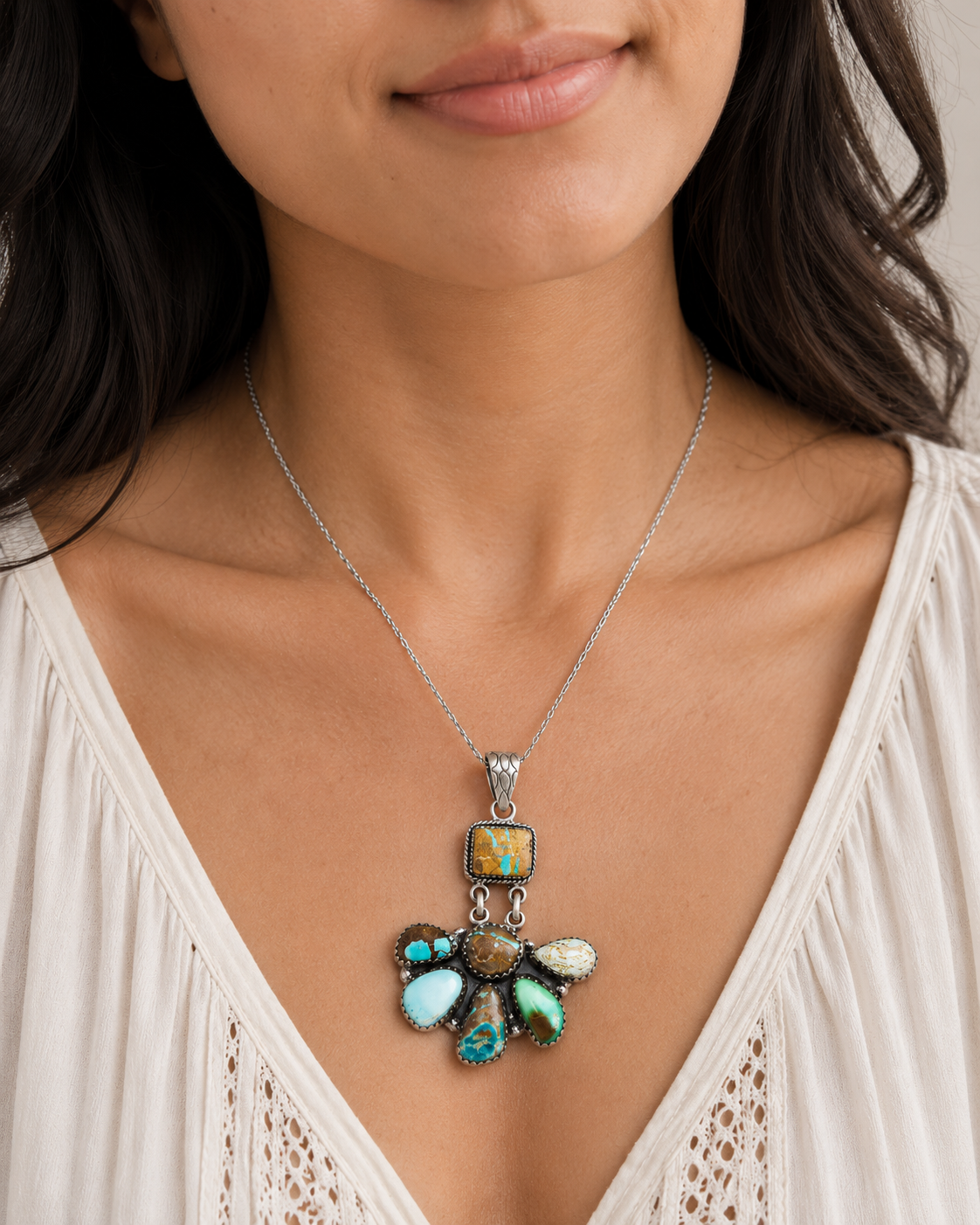 Turquoise inlay sterling silver pendant necklace on chain with flower centerpiece