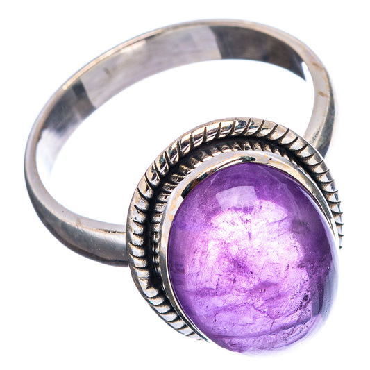 Sterling silver amethyst ring with purple oval stone and rope-textured bezel, size 6.75