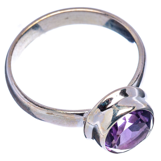 Sterling silver ring band with purple faceted gemstone and open cuff setting