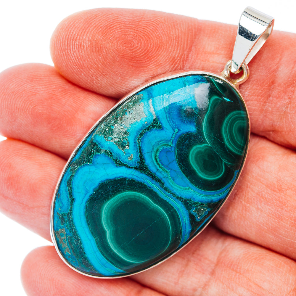 Teardrop malachite and chrysocolla pendant with blue-green stone, silver bezel
