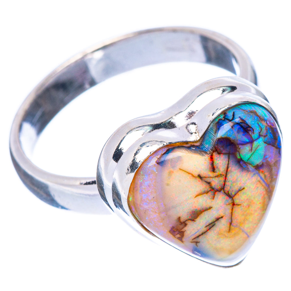 Heart-shaped opal sterling silver ring, side view of iridescent heart cabochon