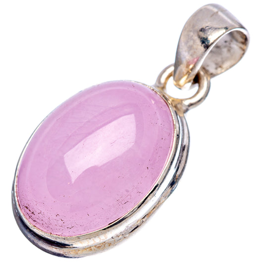 Oval pink gemstone pendant in sterling silver bezel with loop bail