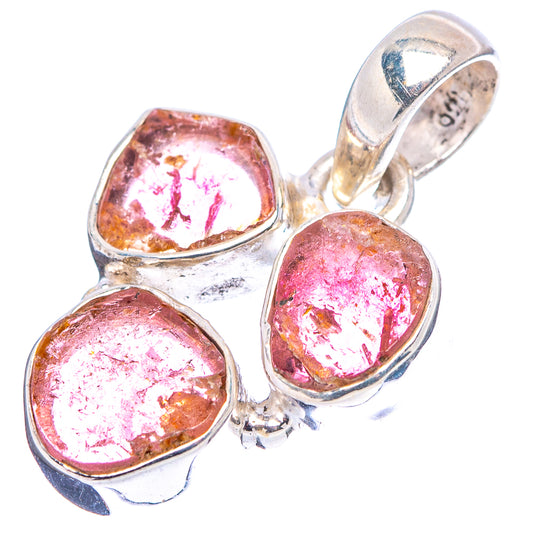 Sterling silver tourmaline pendant with three faceted red-pink gemstones and loop bail