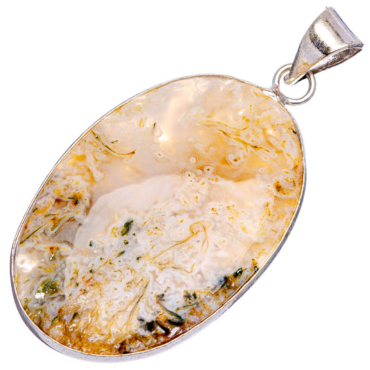 Silver-plated moss agate pendant with oval cabochon, white base with gold and green specks
