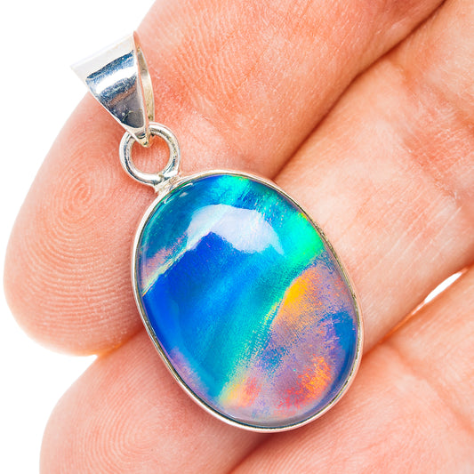 Sterling silver oval opal pendant with blue-green iridescent gemstone and bail