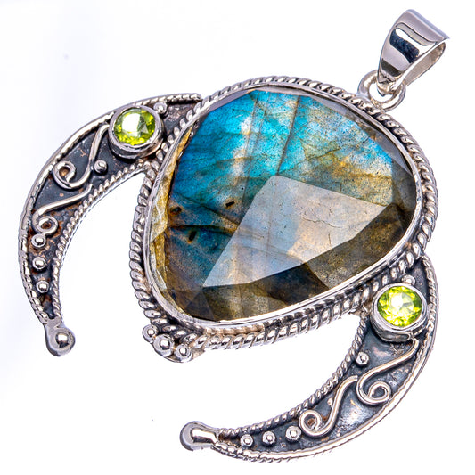 Sterling silver pendant with oval blue labradorite and green peridot bezel settings