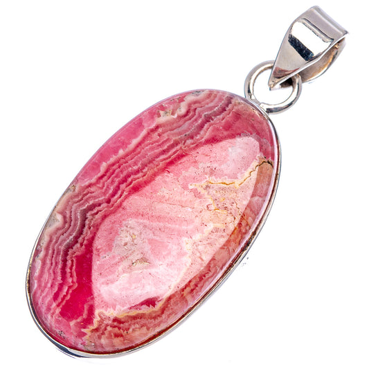 Oval rhodochrosite cabochon pendant set in silver bezel with top loop bail