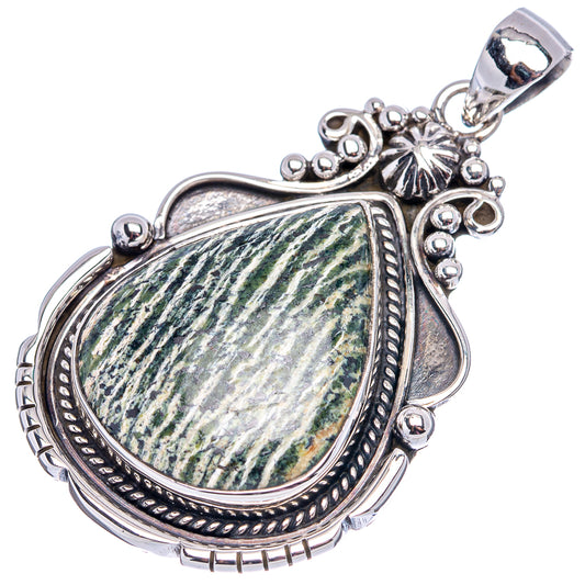 Sterling silver opal pendant with teardrop green stone, carved filigree and starburst bail