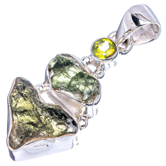 Sterling silver moldavite and peridot pendant with green round bezel-set stone detail