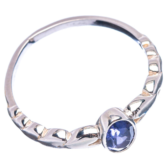 Sterling silver iolite ring with blue oval gemstone and cutout bead-like band