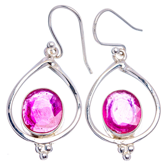 Sterling silver teardrop earrings with bright magenta faceted gemstone and hook backs
