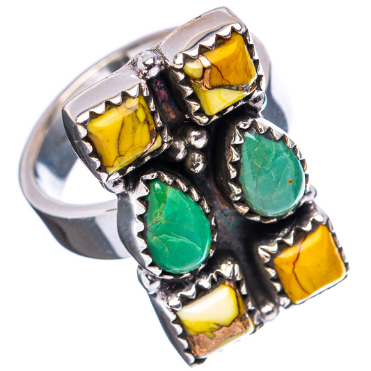 Sterling silver ring showing green oval and yellow square stones in ornate setting