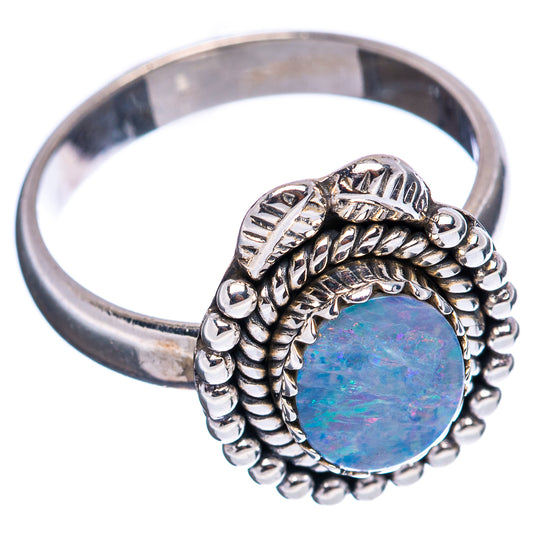 Sterling silver opal doublet ring with oval blue-pink stone and bead-and-leaf band